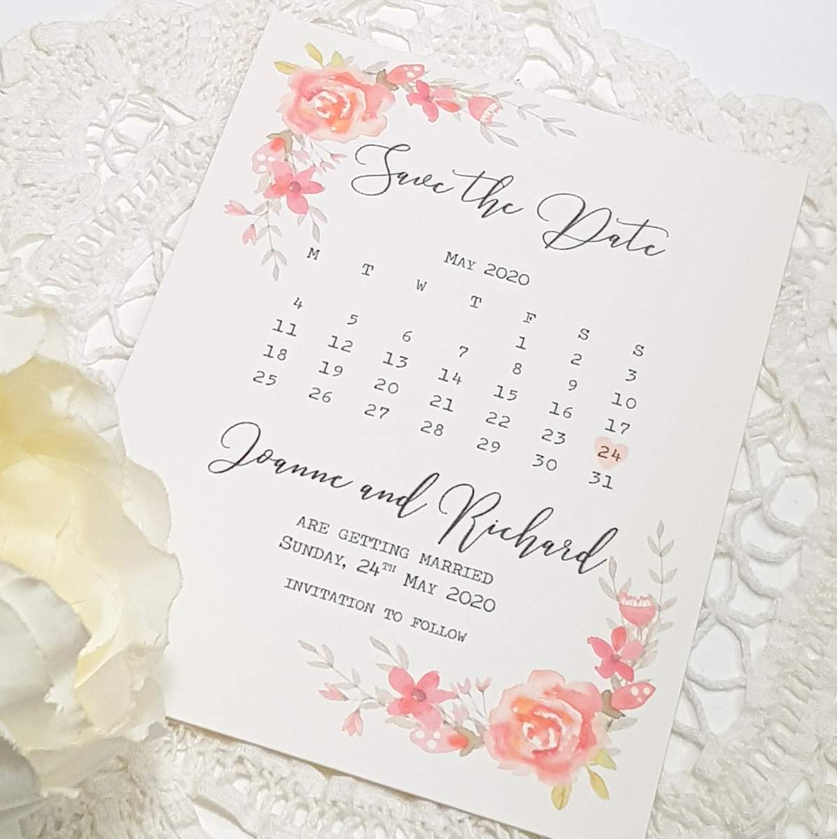 wedding save the date card with pretty pink and coral roses