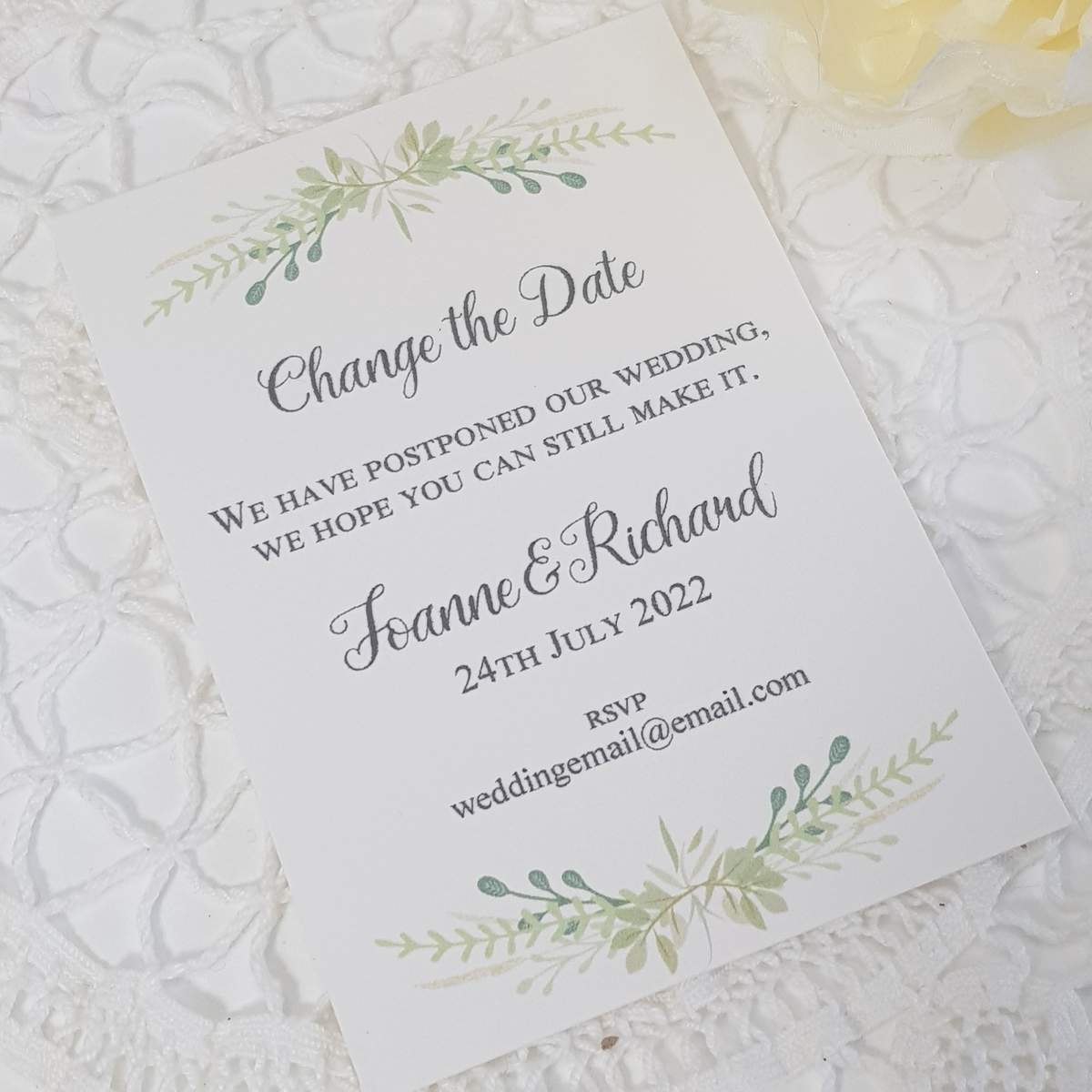 wedding change the date with greenery