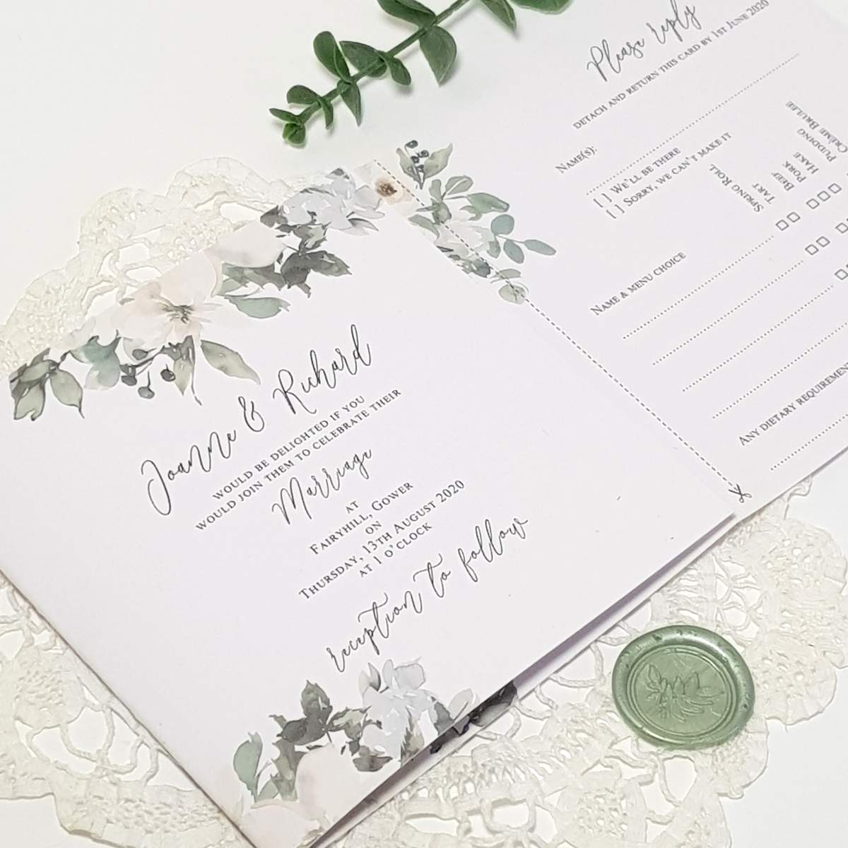 trifold wedding invitation with a wax seal