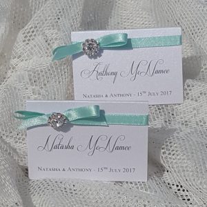 bows and bling aqua and silver place cards