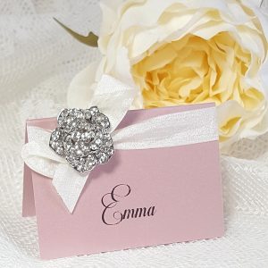 pink place card with bow and diamante