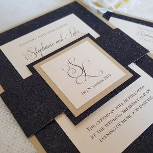 black and gold glitter bellyband invitations