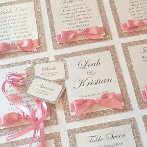 glitterati champagne glitter and pink table plan with tags