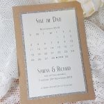calendar style save the date card with kraft card and silver glitter