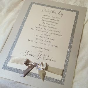 silver glitter order of the day board