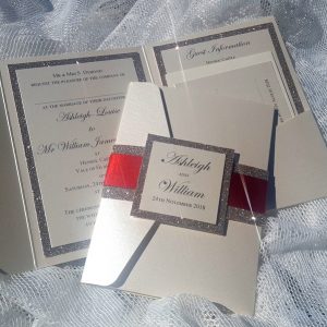 glitterati red ribbon wedding invitation