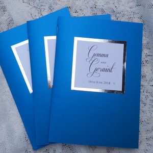 royal blue and chrome metallic order of service