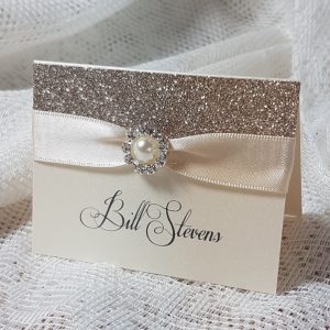 champagne glitter and pearl wedding place card