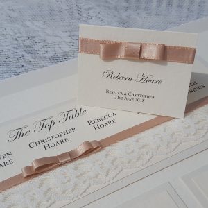 wedding table plan with lace and mocha satin ribbon dior bows