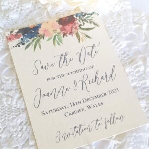 save the date card with burgundy floral design