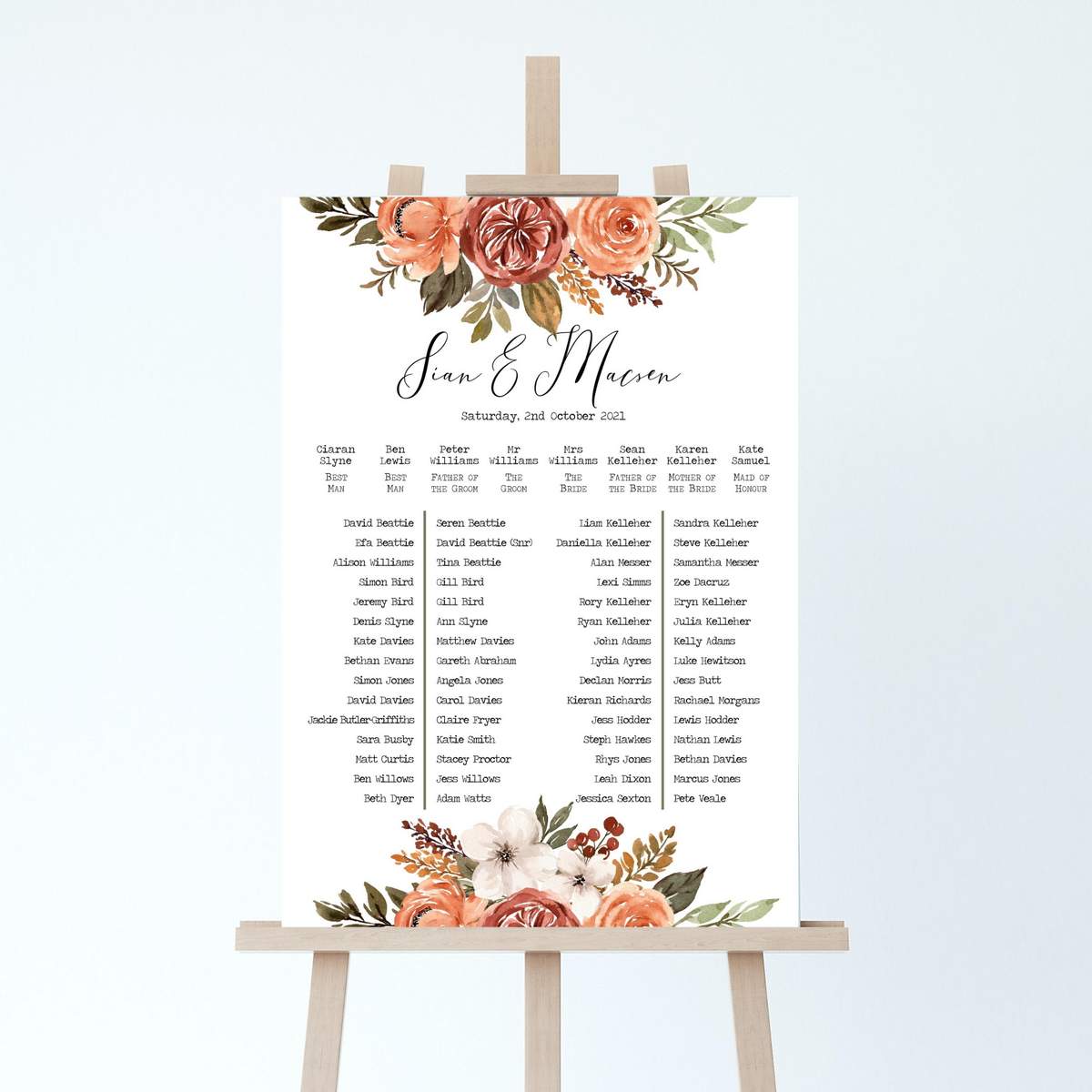 a wedding table plan on an easel with a rustic autumnal floral design
