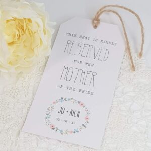 wedding reserved seating tag with a pretty floral hoop design