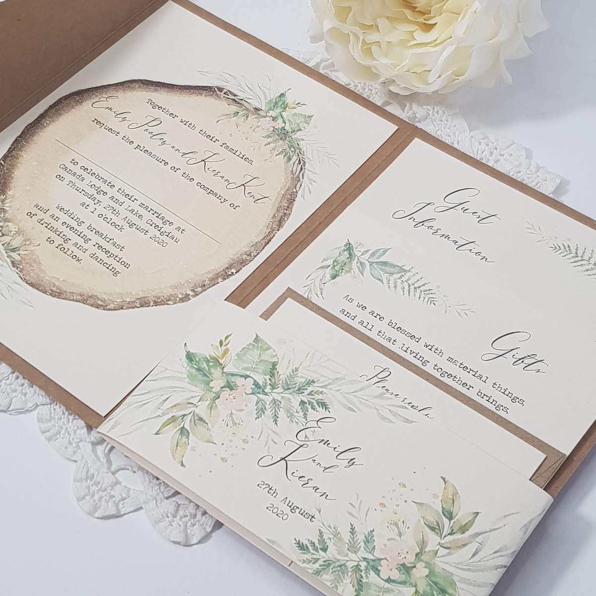 a pocketfold style wedding invitation with a pretty woodland design, the pocket includes a card with a poem asking for money instead of gifts