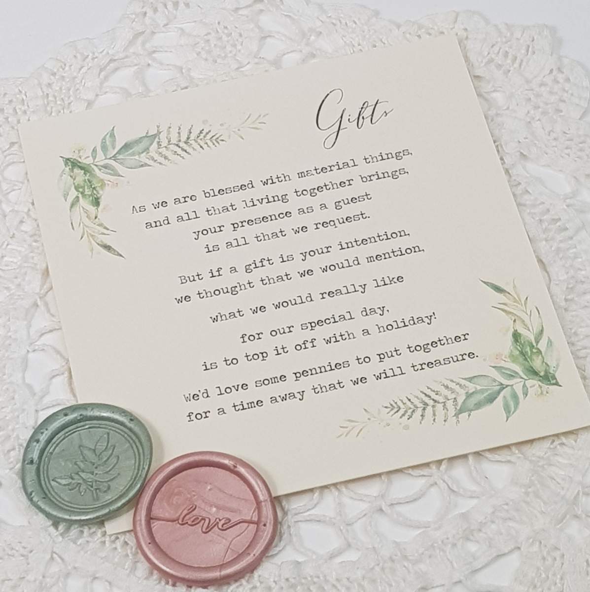 a wedding invite details card with a gift wish poem, decorated on the edges with a pretty greenery foliage design