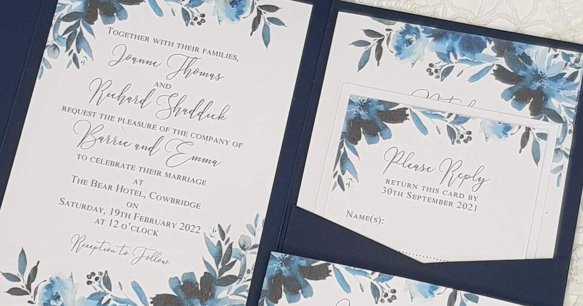 navy wedding invitation with watercolour floral inserts