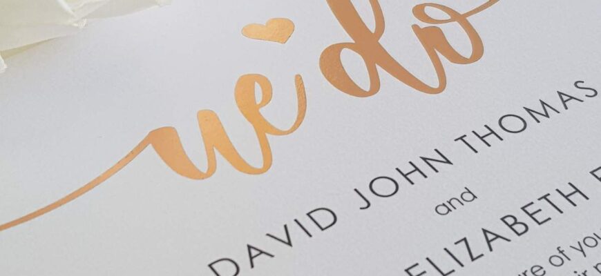 modern calligraphy style wedding invitation with rose gold foil
