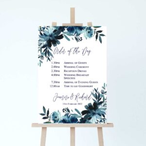 wedding order of the day sign with a navy blue floral design
