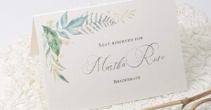 wedding reserbed seating tent card with a greenery print