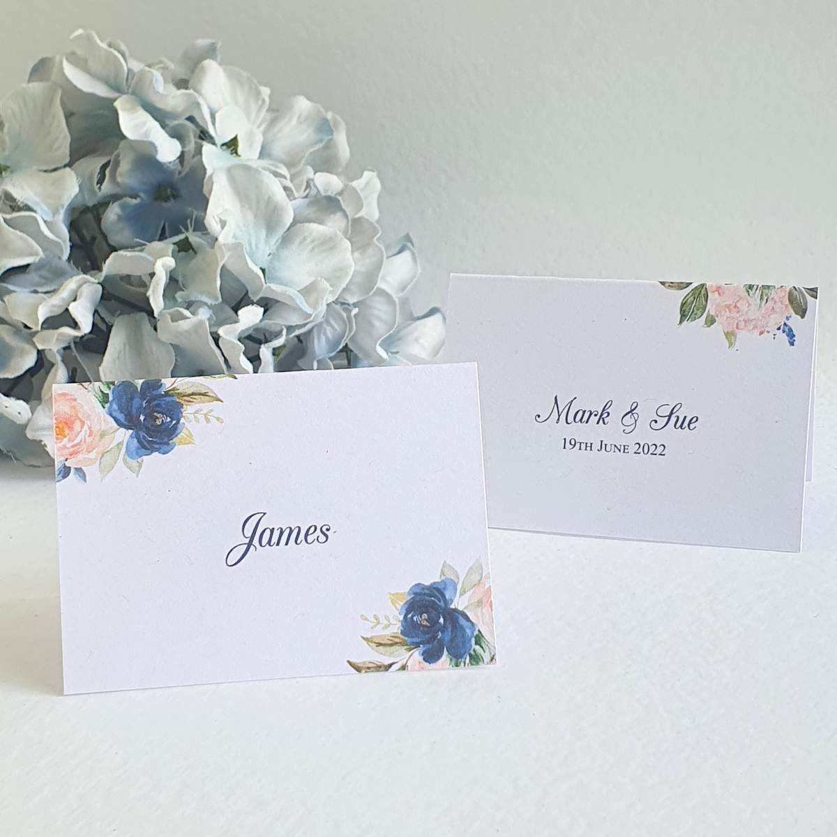 personalised wedding place cards with floral corners