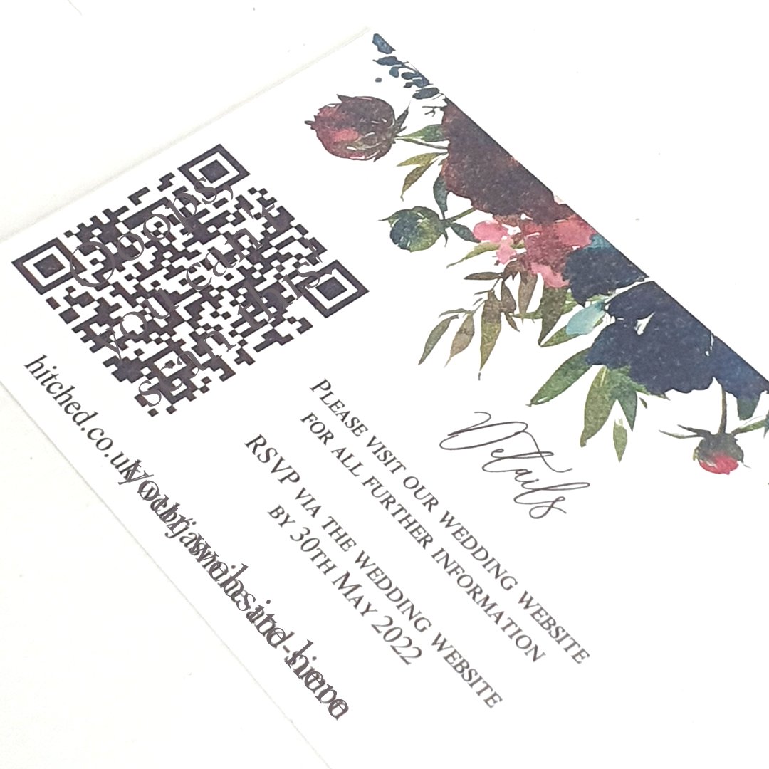 a wedding invitation details card with a QR code to link to a wedding website