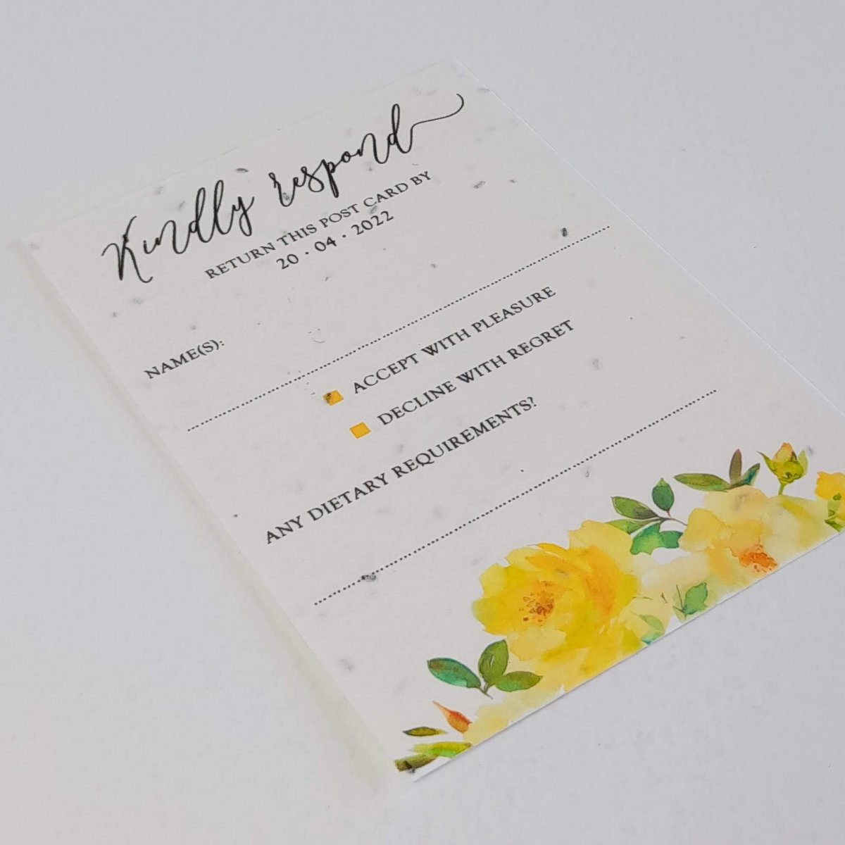 a wedding rsvp card with yellow flower patter, it is printed onto plantable seeded paper