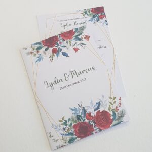 invitations for a christmas wedding with red flowers and green foliage