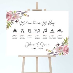 a wedding order of the day timeline with mauve floral accents on an easel