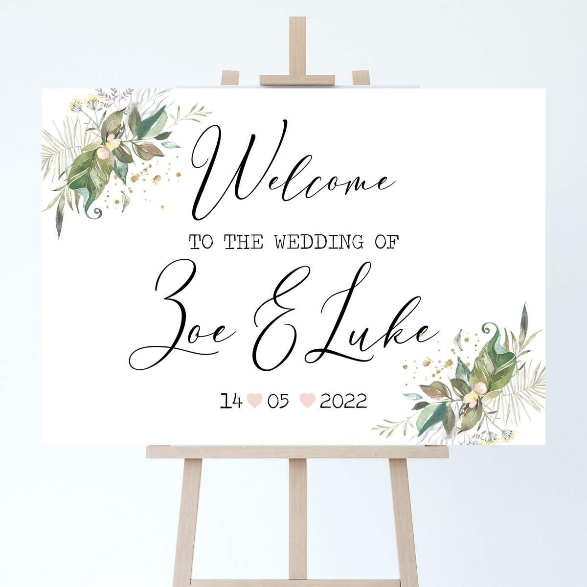 welcome to our wedding sign with woodland greenery delicate pink floral corner decoration