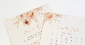 a wedding invitation and matching save the date card with a champagne floral design